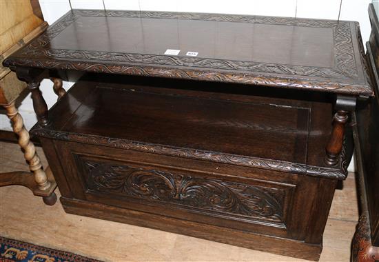 A late Victorian carved oak monks bench